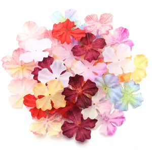 Colorful four-petal fabric flowers for DIY crafts, hair clips and clothing accessories.