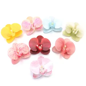 Artificial fabric orchid flower heads for wedding decoration, DIY hair clips and floral arrangements.