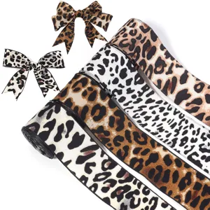 Leopard print ribbon detail shot, perfect for gift wrapping, hair bows, and DIY crafts.