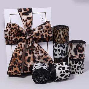 Leopard print ribbon rolls and bow for gift wrapping, DIY crafts, hair accessories and clothing.