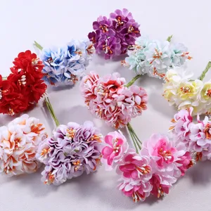 Coloridos ramos de flores artificiales de tela para manualidades, bodas y decoracion.
