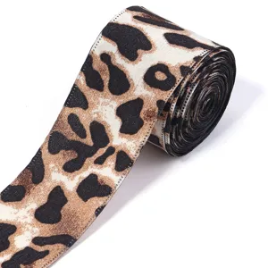 Leopard print ribbon detail shot, overlocked edge silk texture for DIY craft and packaging.