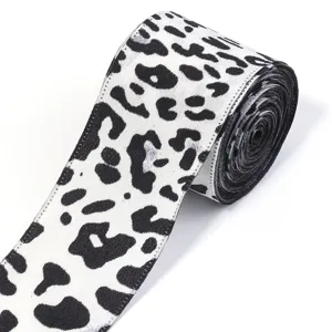 Black and white leopard print ribbon roll detail view for gift box packaging and DIY crafts.