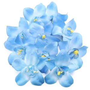 Close up of blue artificial orchid flower heads, perfect for floral wall and craft accessories.