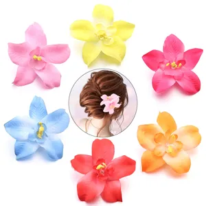 Artificial fabric orchid flower hair clip for wedding, home decor and fashion hair accessories.