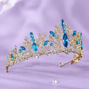 Exquisite gold rhinestone bridal tiara with blue crystals, perfect for wedding party prom.
