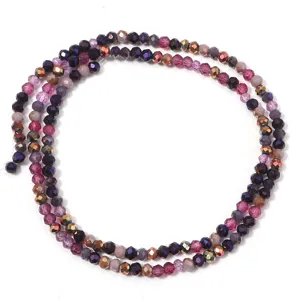Detailed view of multi-color crystal faceted beads for DIY jewelry making and crafts.