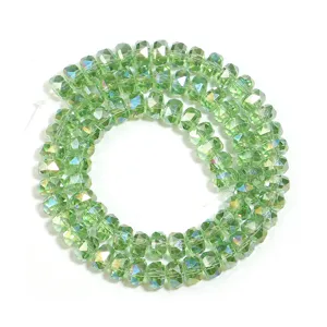 Faceted green crystal rondelle spacer beads for DIY jewelry making and craft accessories.