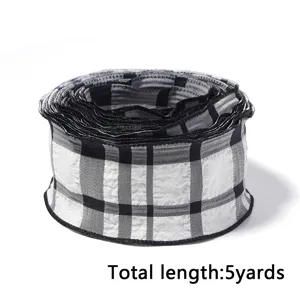 Black and white plaid ribbon detail, polyester bubble textured fabric, 5 yards length.
