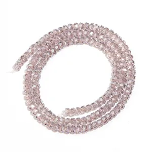 Faceted crystal rondelle spacer beads detail, light purple sparkle DIY jewelry making charm.