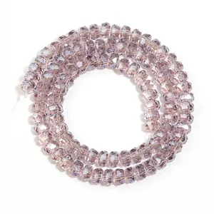 Faceted crystal rondelle spacer beads, light purple glass DIY jewelry crafting details.