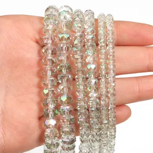 Close-up detail of multi-strand faceted crystal rondelle spacer beads with AB rainbow sheen.