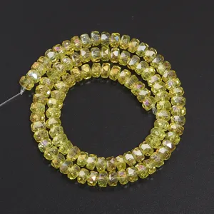 Faceted crystal wheel spacer beads for DIY jewelry making, charm bracelets, and craft projects.