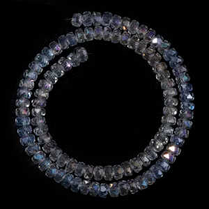 Faceted crystal wheel spacer beads detail shot, showing sparkling cut surfaces and AB finish.