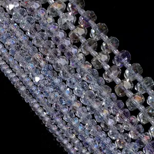 Closeup detail of faceted crystal rondelle spacer beads, sparkling ab finish for jewelry making.