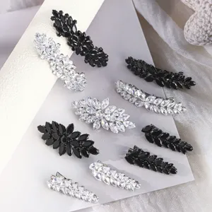 Ensemble de pinces à cheveux en zircone marquise avec strass noirs et blancs étincelants.