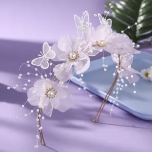 French sweet luxury bridal hair hoop with pink organza flowers and pearls for wedding.