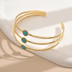 Bracciale da braccio aperto multistrato dorato di tendenza con pietre turchesi donna.