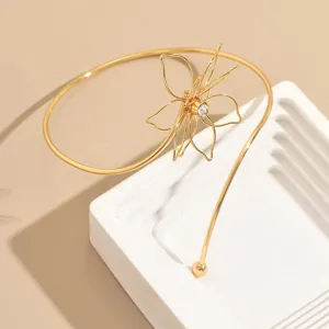 Bracciale da braccio con fiore in filo d'oro elegante minimalista moda gioiello chic.