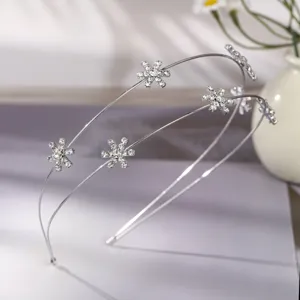 Detailed close-up of double layer silver rhinestone star hair hoop, elegant accessory.