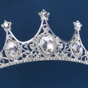Silver rhinestone bridal tiara detail shot, sparkling crystal crown hair accessory.