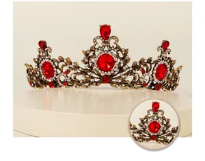 Close-up detail view of vintage baroque red rhinestone tiara crown with delicate alloy filigree.