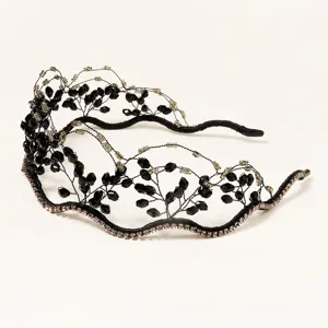 Handmade black crystal bridal headband with sparkling rhinestones for wedding party hair.