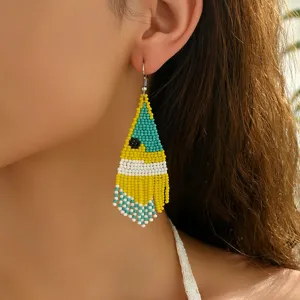 Handmade bohemian beaded fringe earrings, colorful geometric drop design for women style.