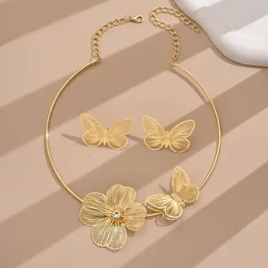 Elegant gold-tone hollow flower butterfly choker necklace and earrings jewelry set for women.