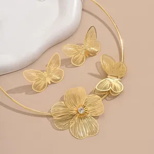 Elegant gold-colored hollow wire butterfly and flower necklace collar jewelry set.