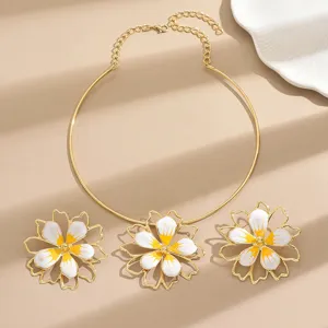 Gold tone hollow flower jewelry set with white yellow enamel petals collar necklace and stud earrings