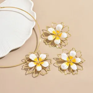 Chic oil-drop flower choker and earrings set, hollow double-layer petal jewelry for women.