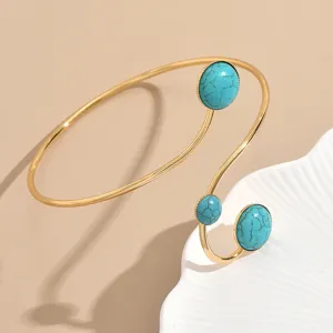 Bracelet de bras ouvert doré avec pierres turquoise bijou corporel géométrique chic