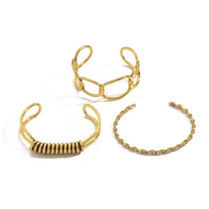 Set di 3 bracciali rigidi aperti geometrici dorati da donna, gioielli da polso retrò traforati.
