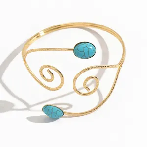 Bracciale da braccio aperto geometrico esagerato da donna con pietre turchesi di tendenza.