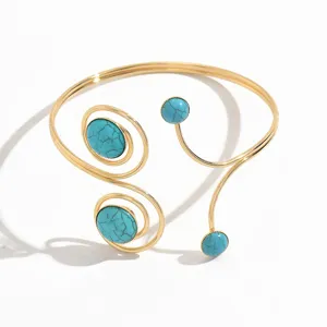 Splendido bracciale da braccio aperto dorato con pietre turchesi, gioiello geometrico donna.