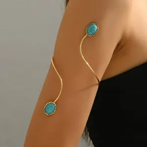 Bracciale da braccio in oro turchese polsino superiore catena corpo vista dettagliata