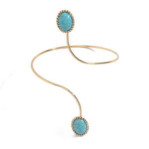 Bracciale da braccio aperto dorato con pietre turchesi eleganti da donna chic.