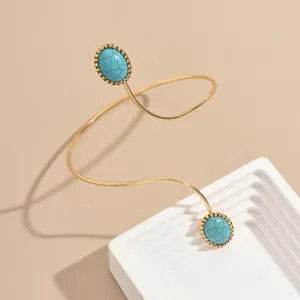 Bracciale da braccio geometrico aperto con finta turchese per donna, gioiello elegante e chic.