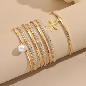 Ensemble de 7 bracelets dorés multicouches avec perle et pendentif étoile de mer femme.