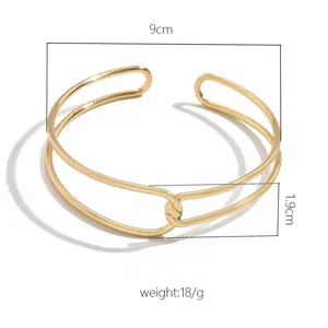 Bracciale da braccio aperto dorato, design geometrico doppio, gioiello elegante da donna.