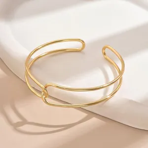 Bracciale rigido aperto geometrico a doppio strato dorato minimalista per le donne