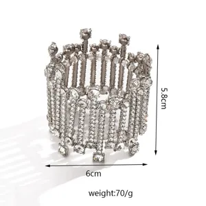 Detailed close-up view of wide rhinestone stretch bracelet, sparkling crystal design.