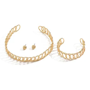 Gold geometric cutout collar necklace bracelet and earrings jewelry set for daily wear.