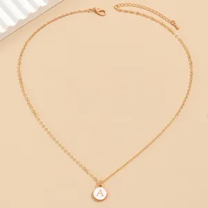 Minimalist gold long chain necklace with a white enamel letter A pendant for daily chic wear.