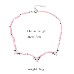 Beaded cow necklace detail showing chain length 36cm plus 5cm extension for women.