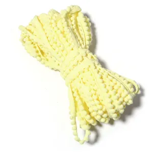 Yellow pom pom trim for DIY crafts, sewing apparel, handmade hair clips and home decoration.