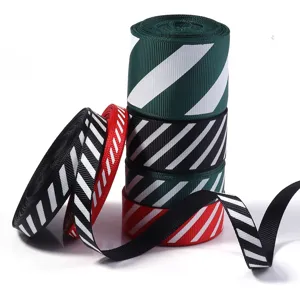 Striped grosgrain ribbon rolls for gift wrapping, clothing and DIY craft projects.