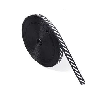Black white diagonal stripe ribbon detail view, ideal for DIY sewing, clothing trim and gift wrapping.