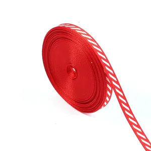 Red and white diagonal striped grosgrain ribbon roll for Christmas party gift wrapping DIY.
